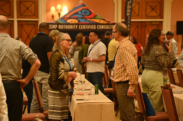 conference attendees mingling between presentations